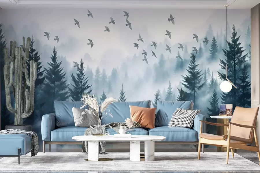 Fototapetes Mierīgs miglains mežs ar kokiem zilos toņos, un debesīs lido putnu bars  w08664
